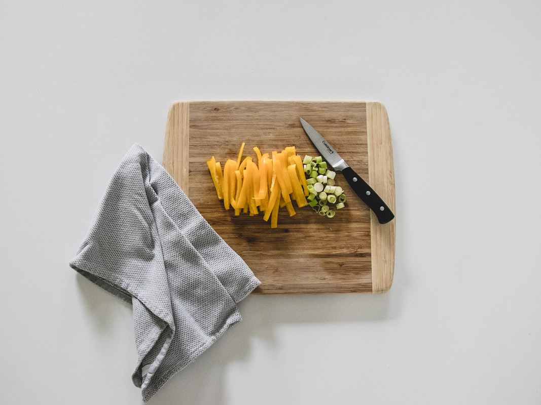 Student preparing healthy meal in kitchen